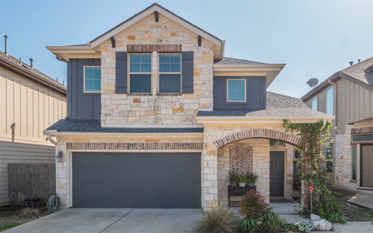 7337 Menchaca Road, Unit 31 Austin, TX 78745 - Photo 1 of 1 a front view of a house with yard
