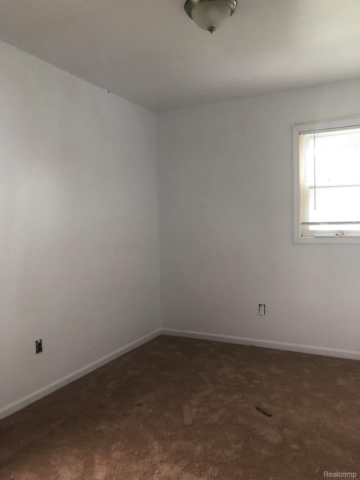 11562 North Fowlerville Road Fowlerville, MI 48836 - Photo 18 of 19 Bedroom #1 with new carpet
