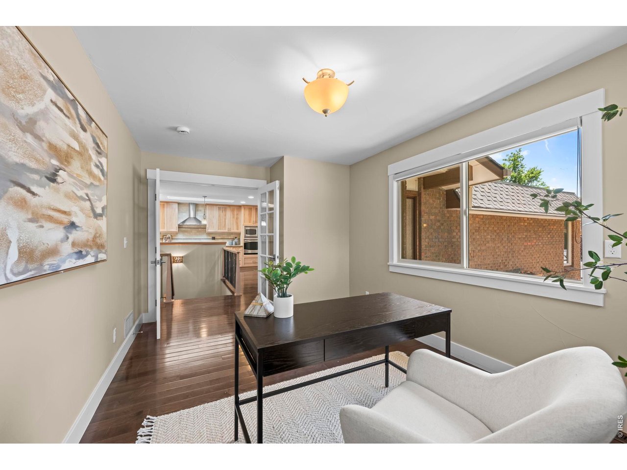 4824 Briar Ridge Court Boulder, CO 80301 - Photo 20 of 40 a workspace with furniture and a potted plant