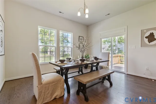 a view of a livingroom with furniture and a table