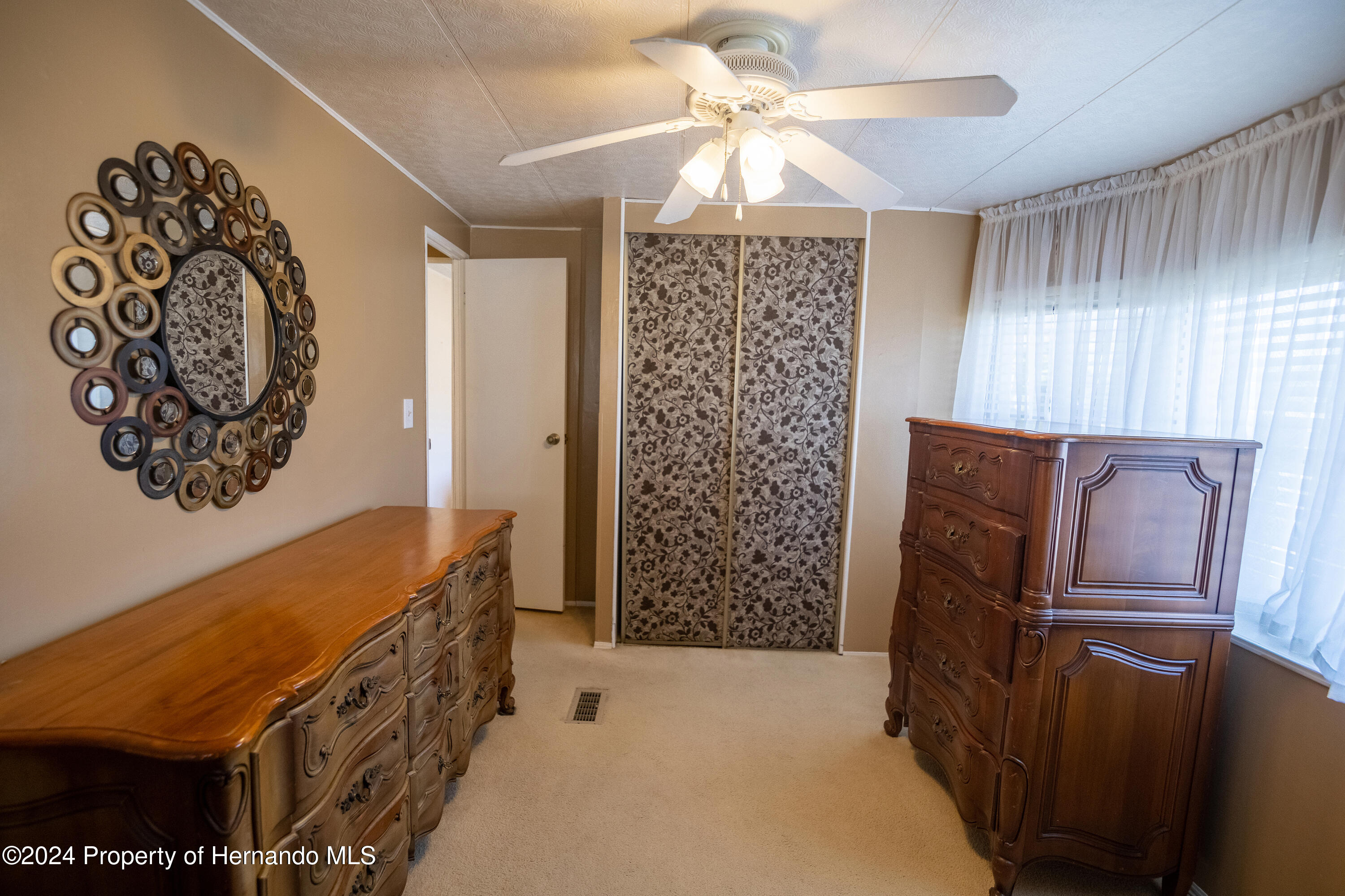 7526 Highpoint Boulevard Brooksville, FL 34613 - Photo 22 of 30 a kitchen with stainless steel appliances granite countertop a refrigerator a oven a sink and dishwasher