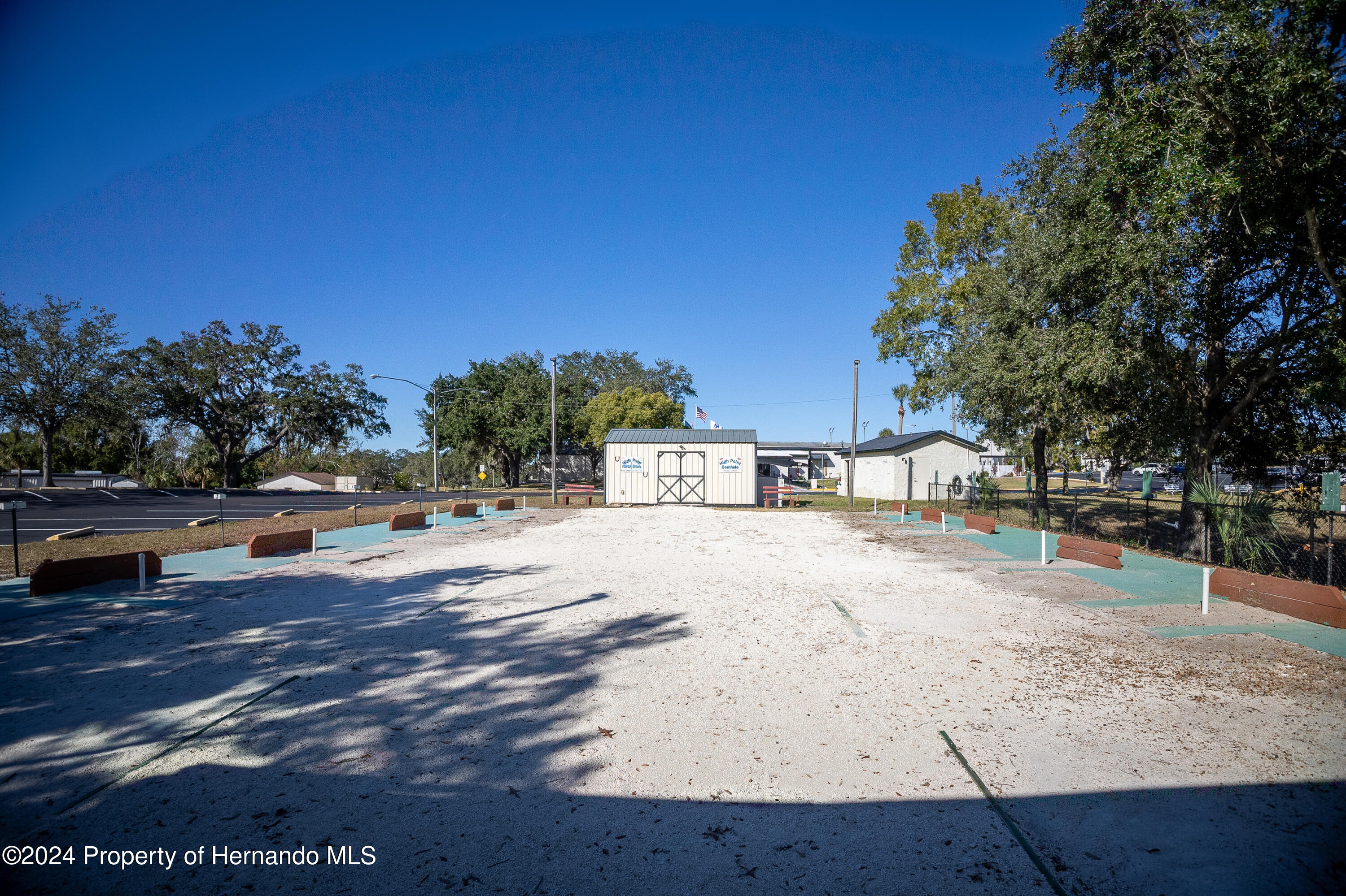 7526 Highpoint Boulevard Brooksville, FL 34613 - Photo 30 of 30 a street view with residential house