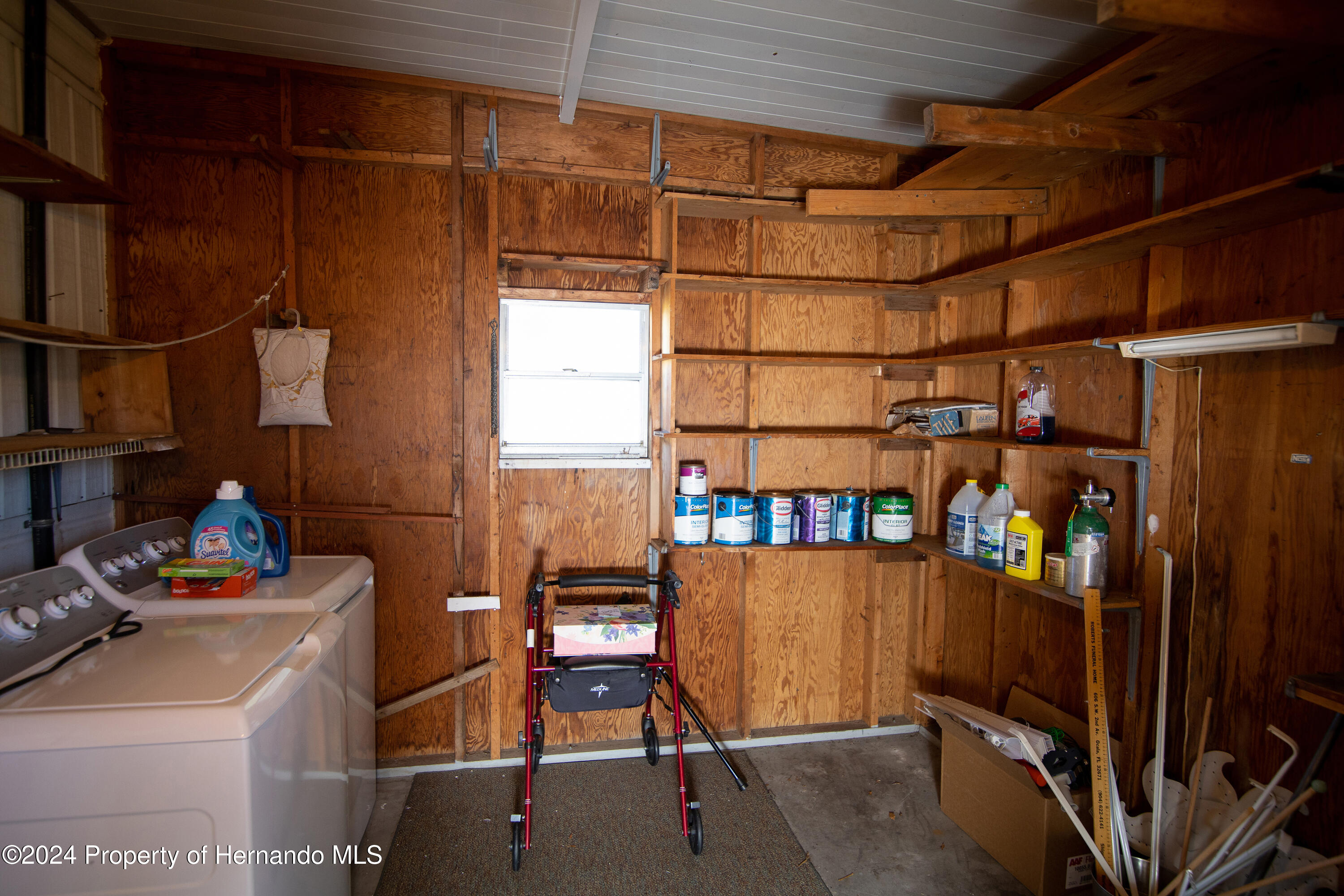 7526 Highpoint Boulevard Brooksville, FL 34613 - Photo 7 of 30 a view of storage and utility room