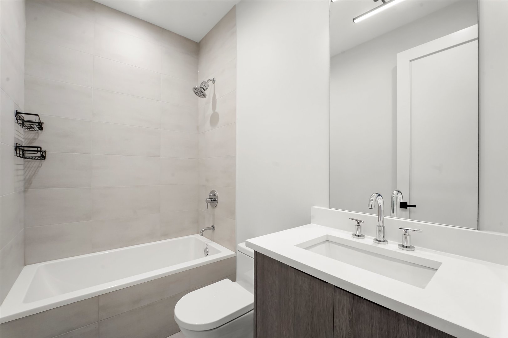 117 South Bell Avenue, Unit 4N Chicago, IL 60612 - Photo 11 of 30 a bathroom with a sink a toilet and bathtub