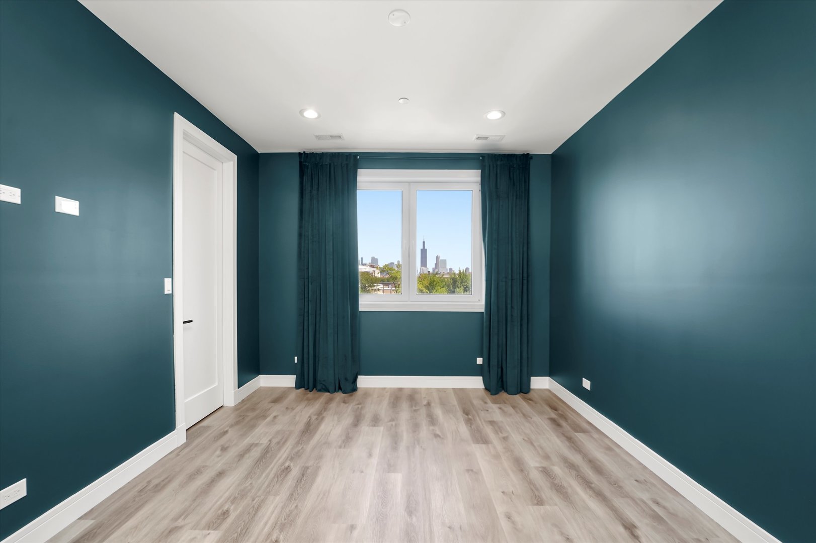 117 South Bell Avenue, Unit 4N Chicago, IL 60612 - Photo 17 of 30 a view of hallway with wooden floor