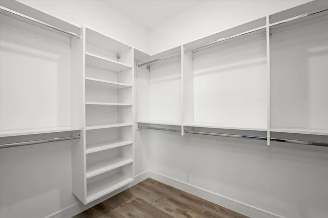 a view of an empty walk in closet
