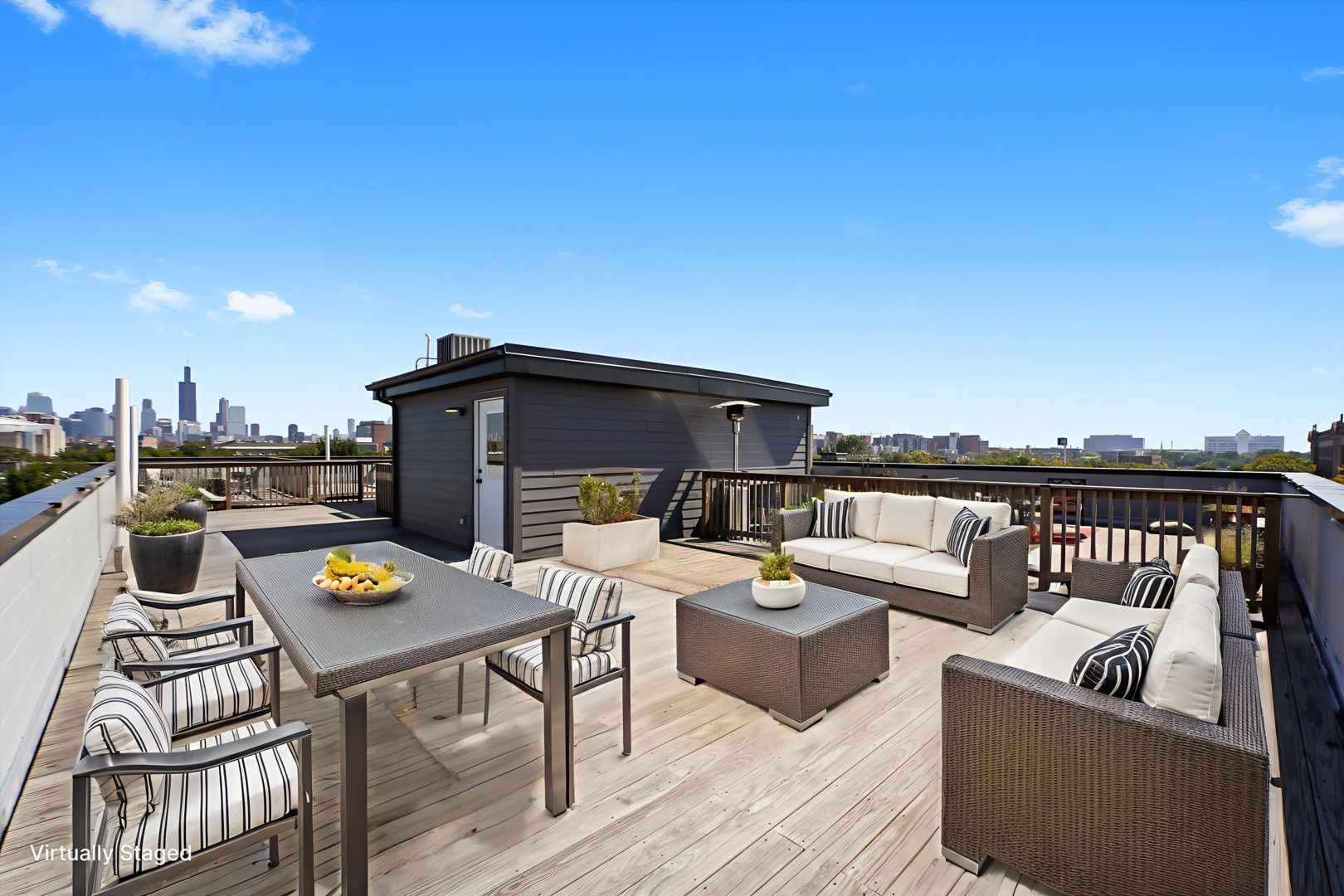 117 South Bell Avenue, Unit 4N Chicago, IL 60612 - Photo 25 of 30 a view of a terrace with couches and potted plants