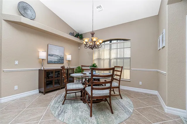 a view of a dining room kitchen and a window