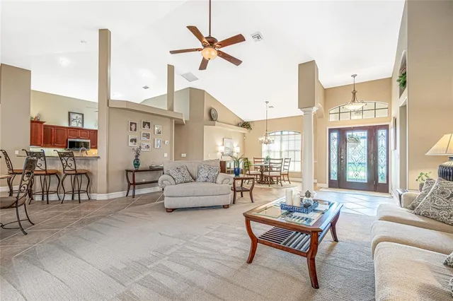 a kitchen with stainless steel appliances granite countertop a stove a sink dishwasher and a refrigerator