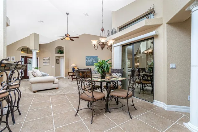 a bedroom with furniture and a flat screen tv
