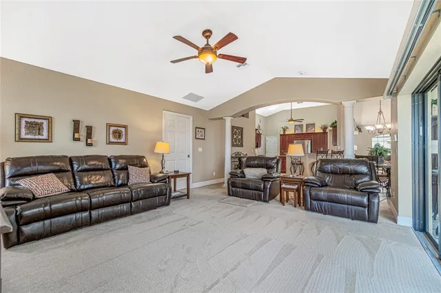 a bathroom with a bathtub sink and mirror