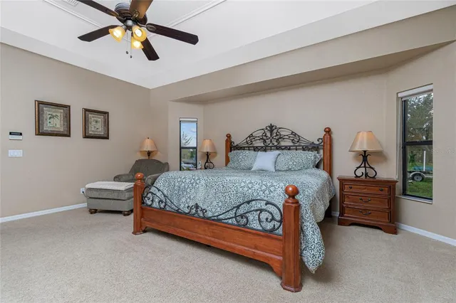 a bedroom with furniture and a bed