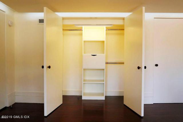 424 Cognewaugh Road Cos Cob, CT 06807 - Photo 22 of 27 a view of empty room with wooden floor