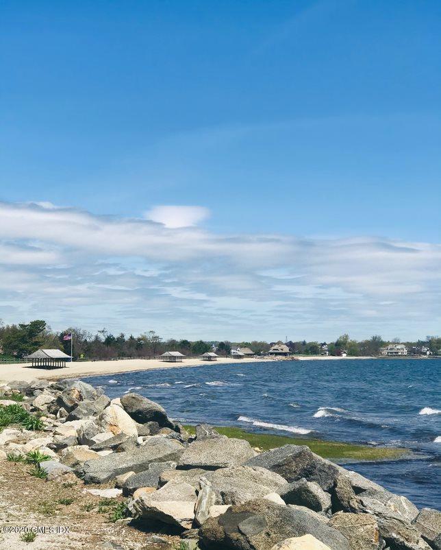 424 Cognewaugh Road Cos Cob, CT 06807 - Photo 27 of 27 a view of an ocean and beach