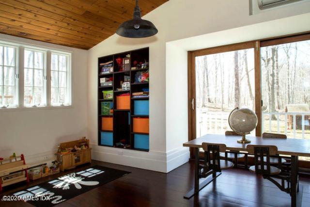 424 Cognewaugh Road Cos Cob, CT 06807 - Photo 9 of 27 a living room with furniture and wooden floor