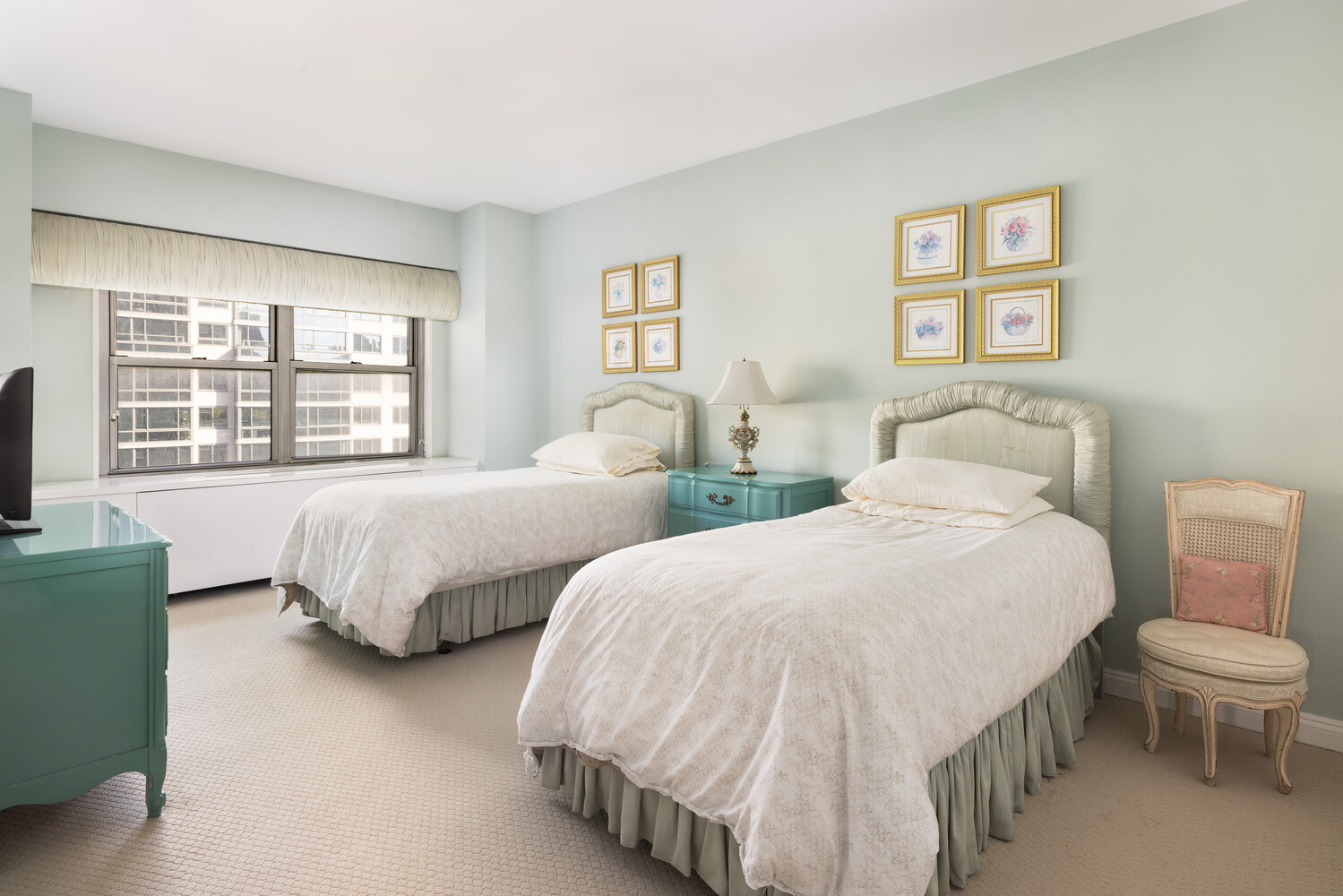 360 East 72nd Street, Unit C1803 Manhattan, NY 10021 - Photo 13 of 15 a bedroom with two beds and a large window