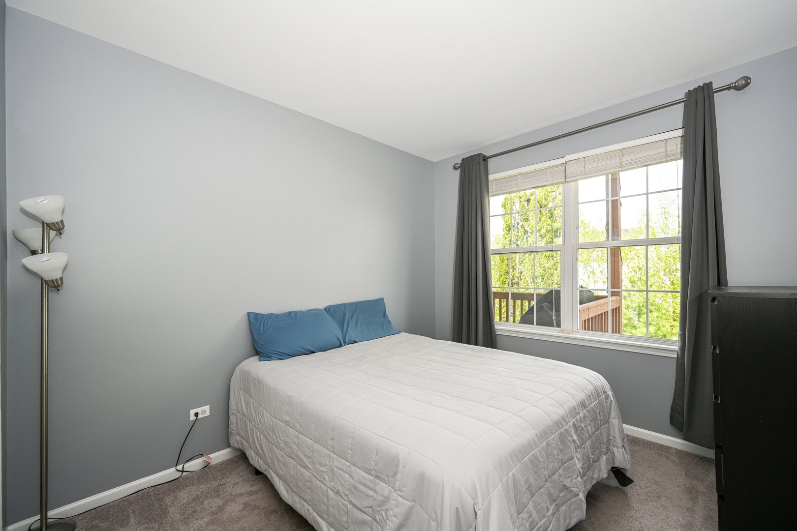2333 Overlook Court, Unit 2333 Naperville, IL 60563 - Photo 14 of 24 a bedroom with a bed and a window