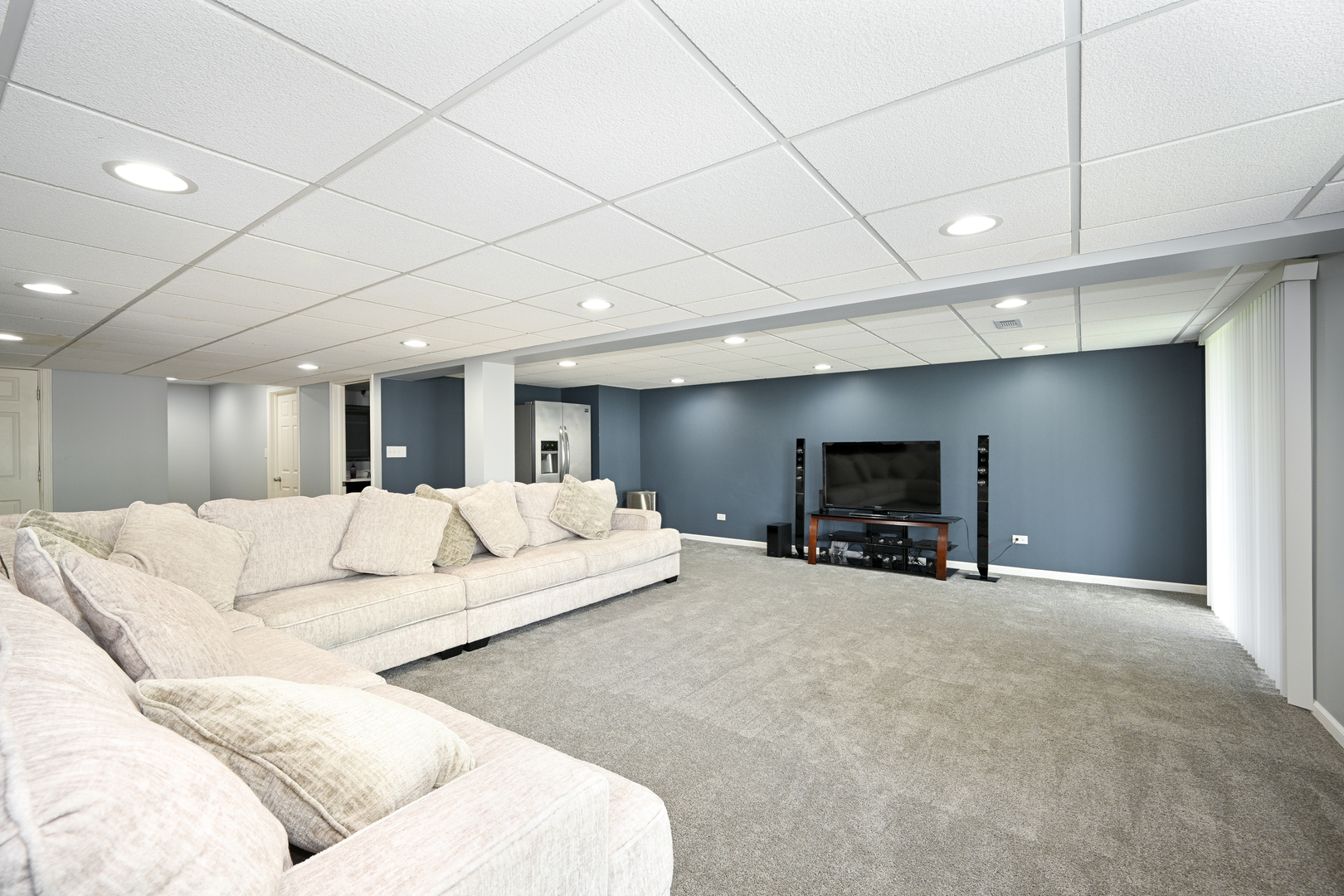 2333 Overlook Court, Unit 2333 Naperville, IL 60563 - Photo 17 of 24 a living room with furniture and a flat screen tv