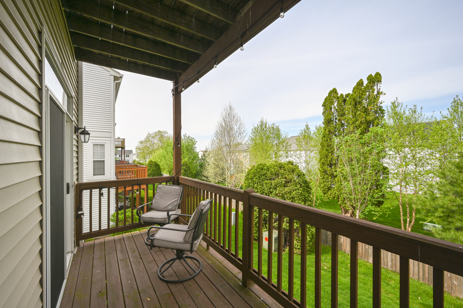 2333 Overlook Court, Unit 2333 Naperville, IL 60563 - Photo 22 of 24 a view of a balcony with wooden floor