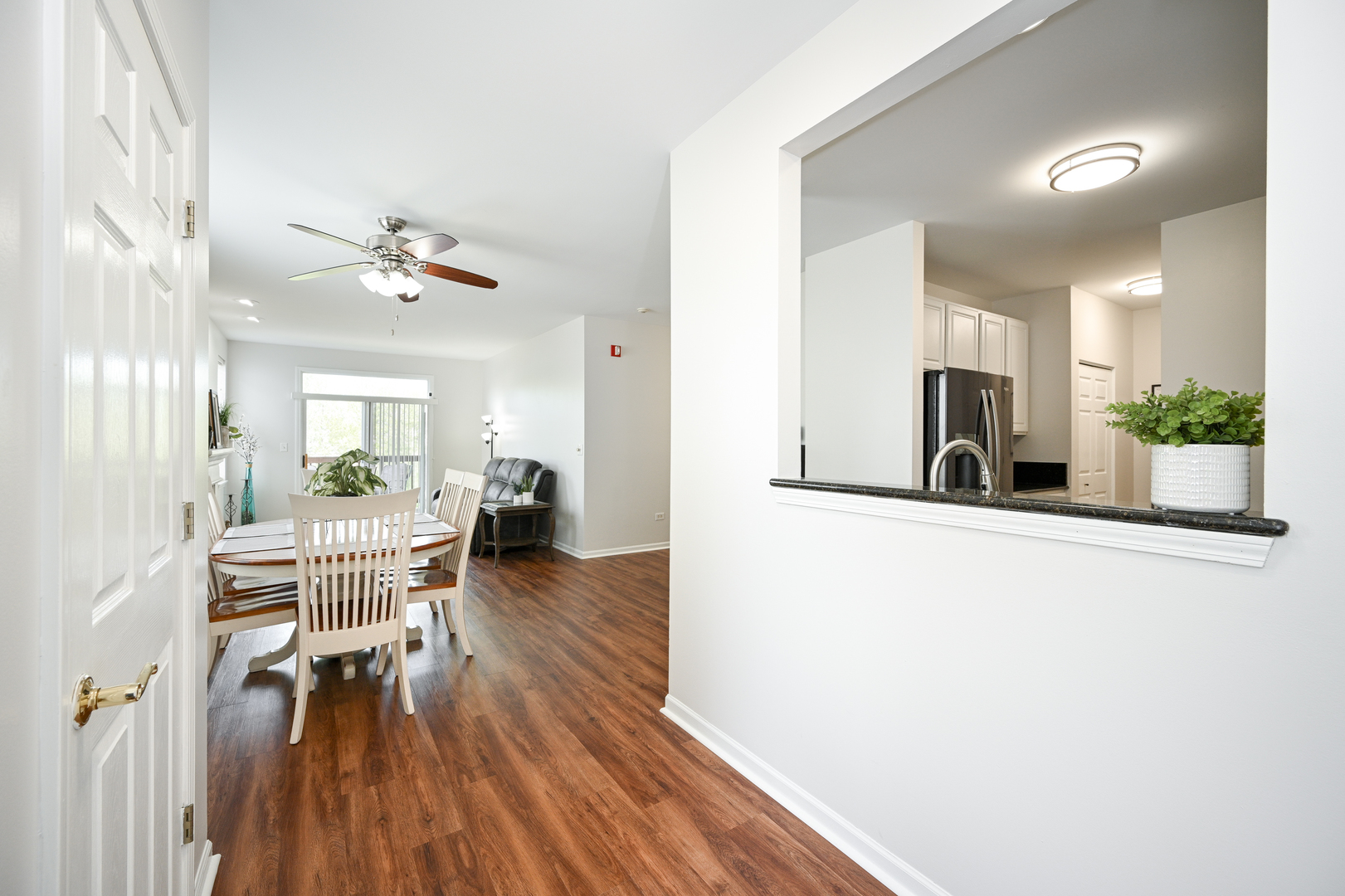 2333 Overlook Court, Unit 2333 Naperville, IL 60563 - Photo 3 of 24 a living room with furniture and wooden floor