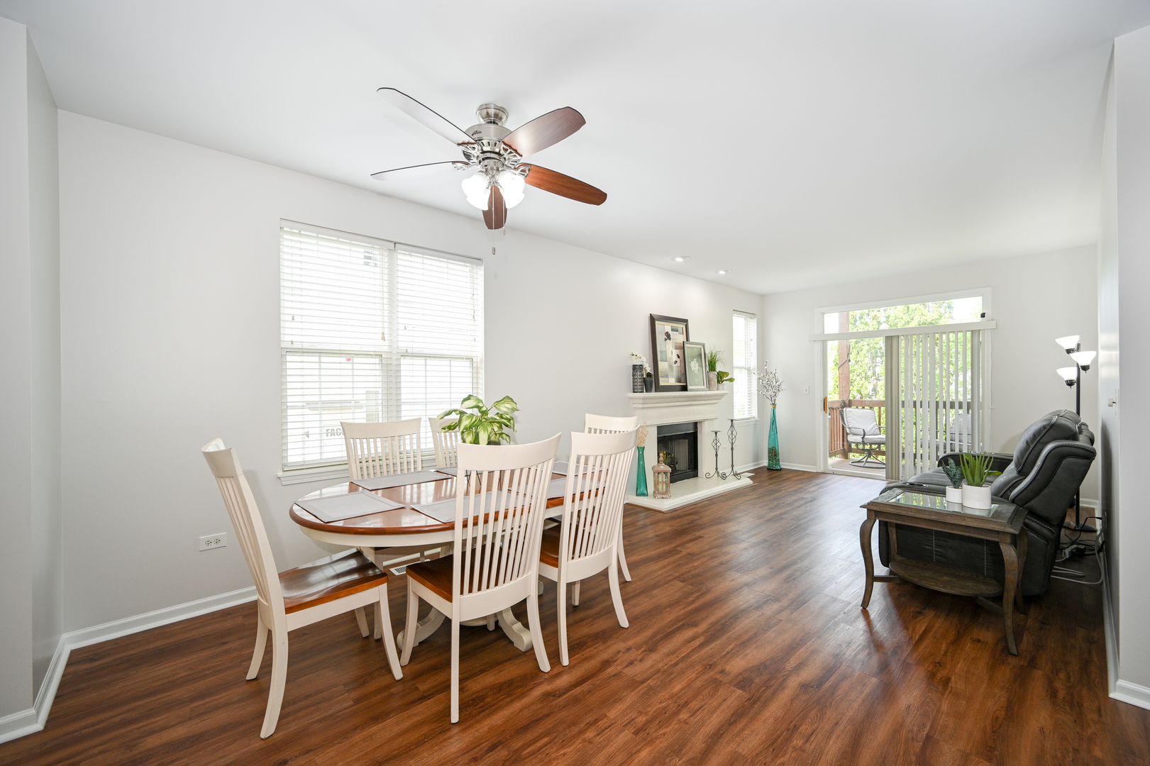 2333 Overlook Court, Unit 2333 Naperville, IL 60563 - Photo 4 of 24 a view of a dining room with furniture and wooden floor