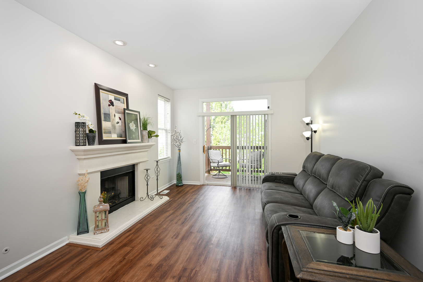 2333 Overlook Court, Unit 2333 Naperville, IL 60563 - Photo 5 of 24 a living room with furniture and a fireplace