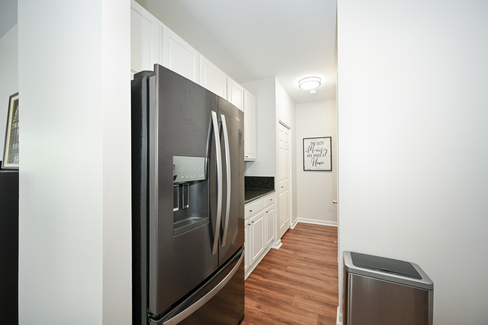 2333 Overlook Court, Unit 2333 Naperville, IL 60563 - Photo 10 of 24 a view of a hallway with wooden floor