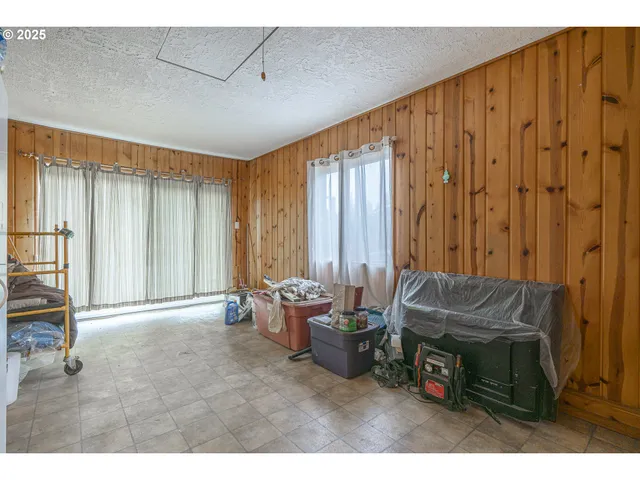 a bed room with a bed and a view