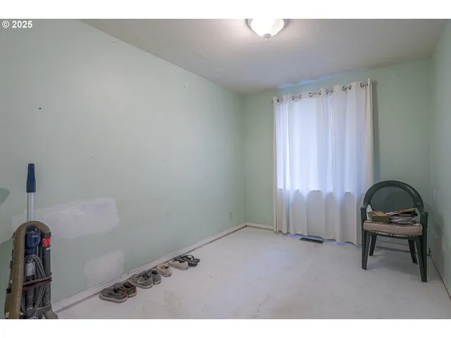 a room with furniture and a window