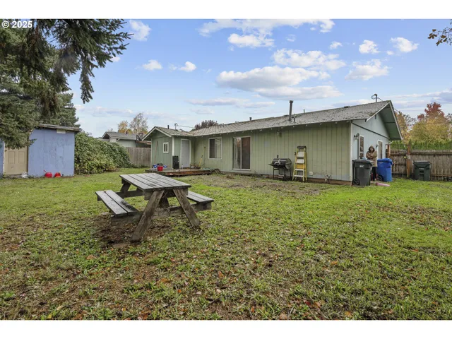 a backyard of a house with lots of green space