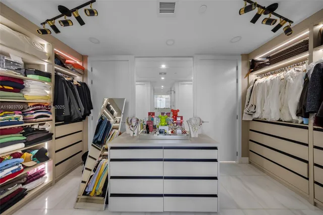 a view of a room with storage and utility room