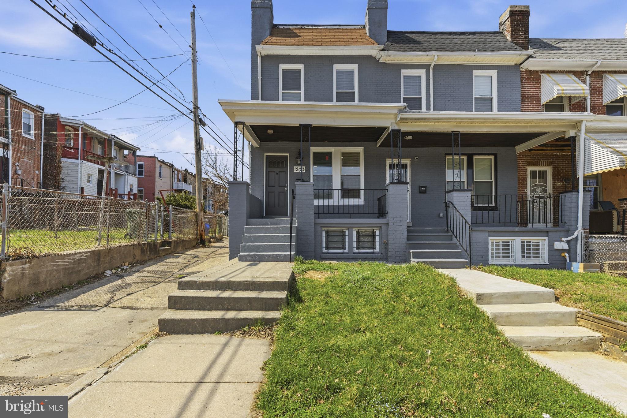 1200 North Dukeland Street Baltimore, MD 21216 - Photo 17 of 17 a view of a building with a yard