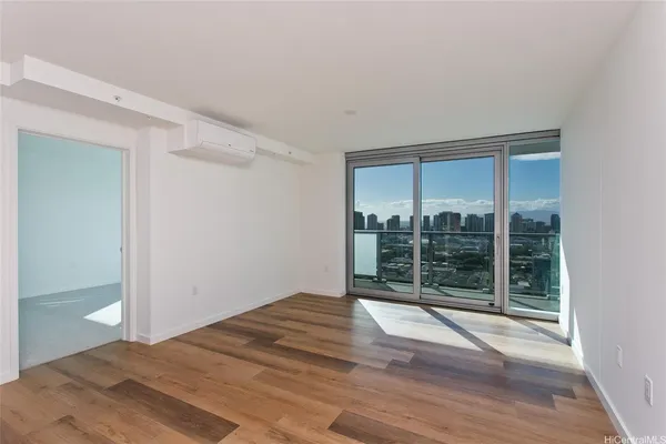 a view of a room with a large window