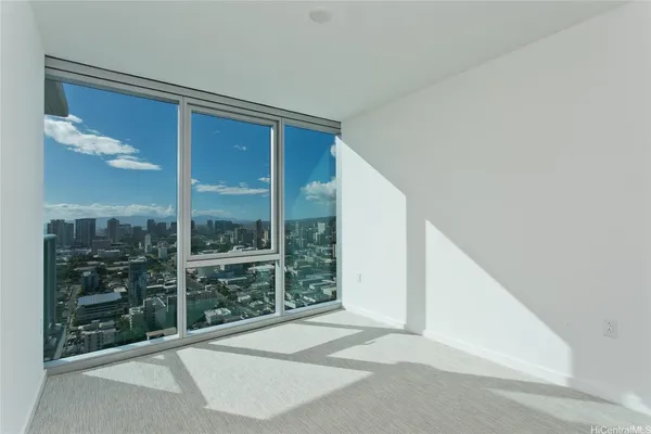 a view of a glass door and a window