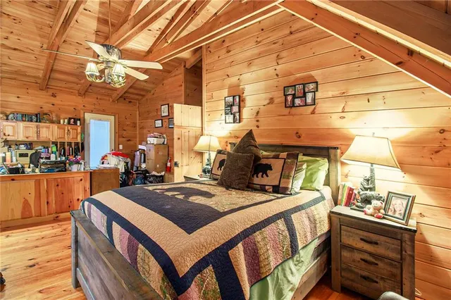 a view of a balcony with stove and refrigerator