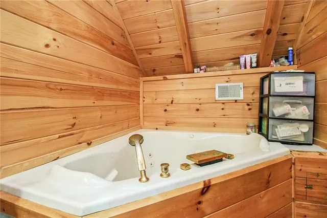a view of deck with table and chairs and wooden floor