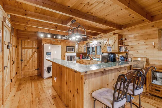 a view of a kitchen with utility room