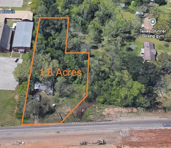 an aerial view of houses with yard