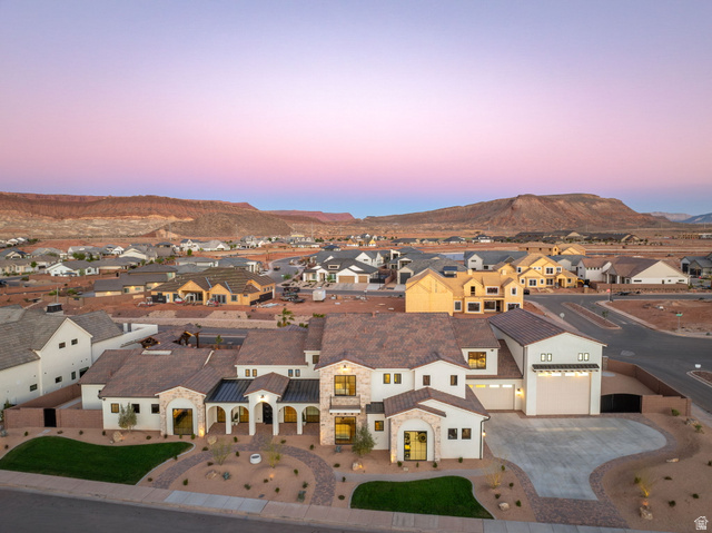 4871 South Homestead Way Washington, UT 84780 - Photo 126 of 151 Aerial view at dusk of a residential view and a mountain view