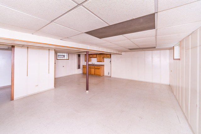 3648 West 81st Street Chicago, IL 60652 - Photo 14 of 17 a view of empty room with wooden floor