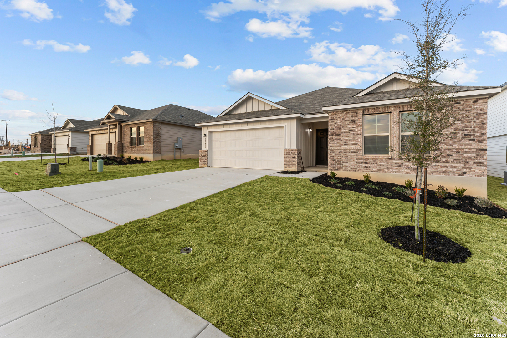 10403 Hotspur Road Converse, TX 78109 - Photo 22 of 28 a front view of a house with a garden