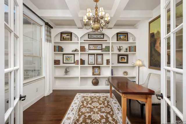 a view of a livingroom with furniture and window