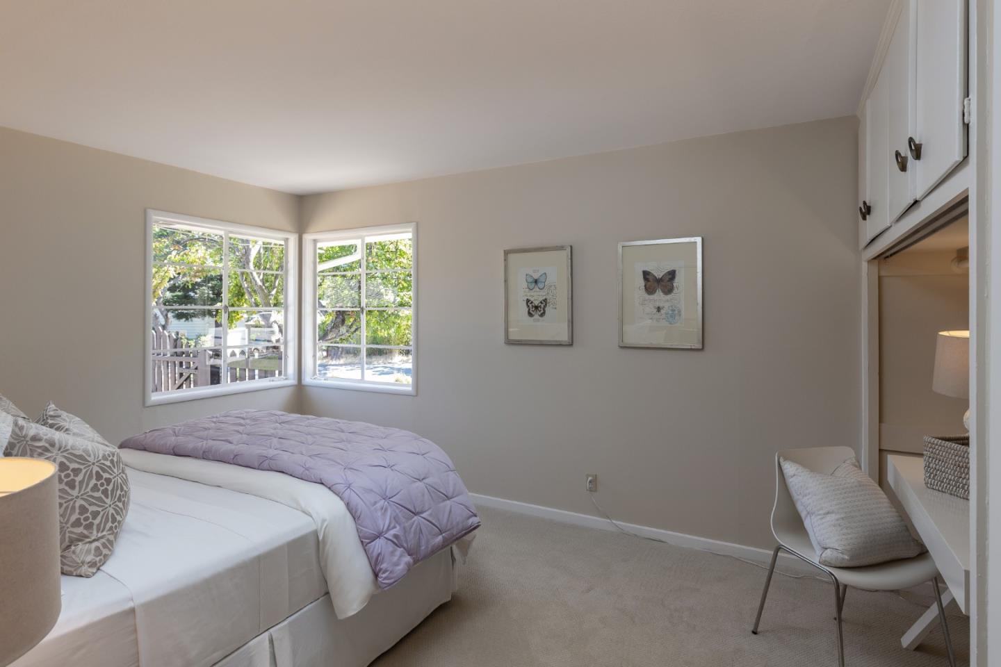 330 Corte Madera Road Portola Valley, CA 94028 - Photo 17 of 24 a bedroom with a bed chair and window
