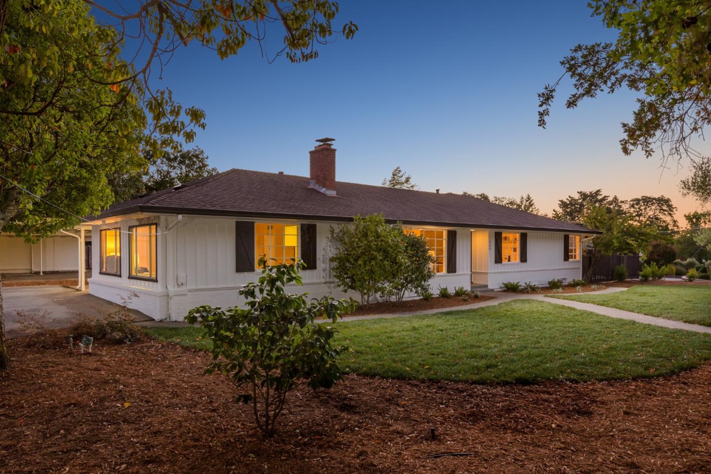 330 Corte Madera Road Portola Valley, CA 94028 - Photo 2 of 24 a front view of a house with a yard
