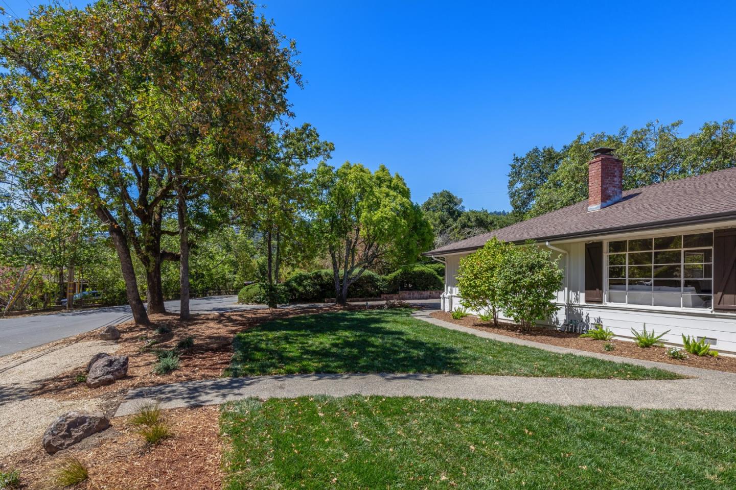 330 Corte Madera Road Portola Valley, CA 94028 - Photo 3 of 24 a view of a house with a yard