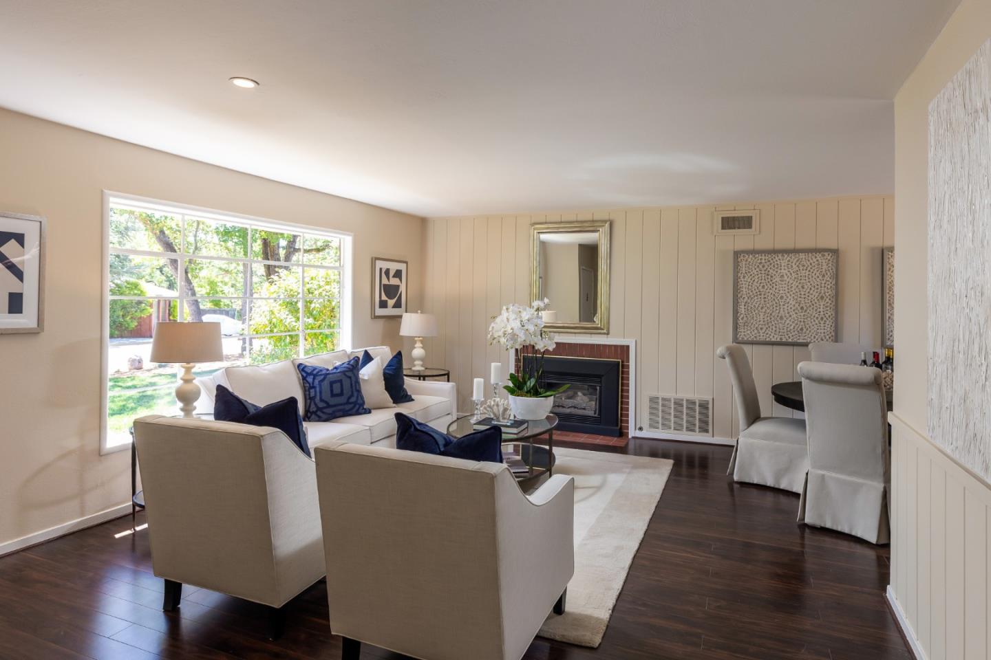 330 Corte Madera Road Portola Valley, CA 94028 - Photo 5 of 24 a living room with fireplace furniture and a wooden floor