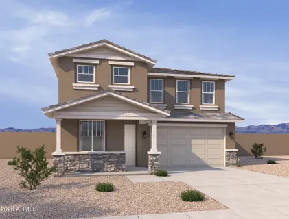 a front view of a house with yard and parking space