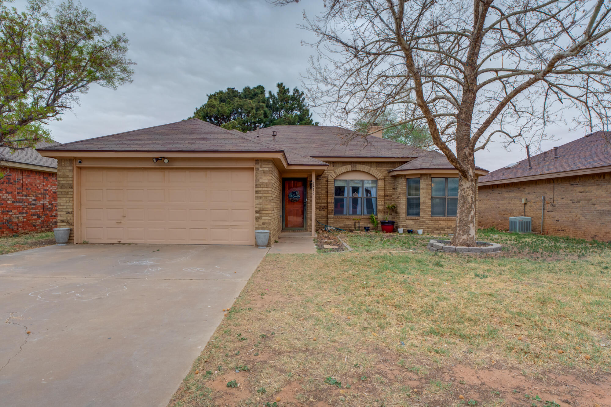 2116 92nd Street Lubbock, TX 79423 - Photo 2 of 26 DSC06224_5_6_7_8