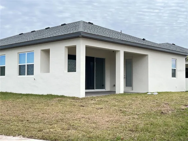 a kitchen with stainless steel appliances a sink stove and refrigerator