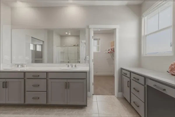 a bathroom with a glass shower door